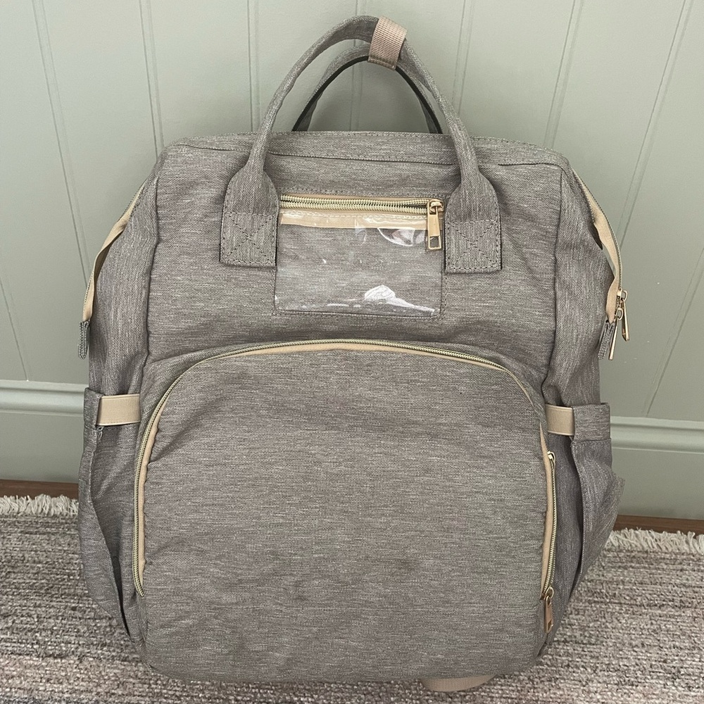Diaper Bag with built-in Bassinet change pad Grey and gold